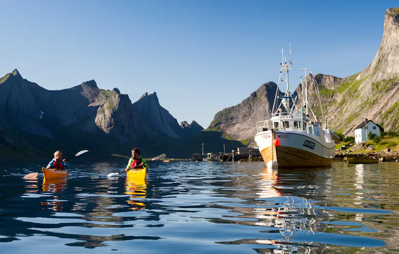 Kayaking in Reinefjorden Reine in the Lofoten islands CH Visit Norway com