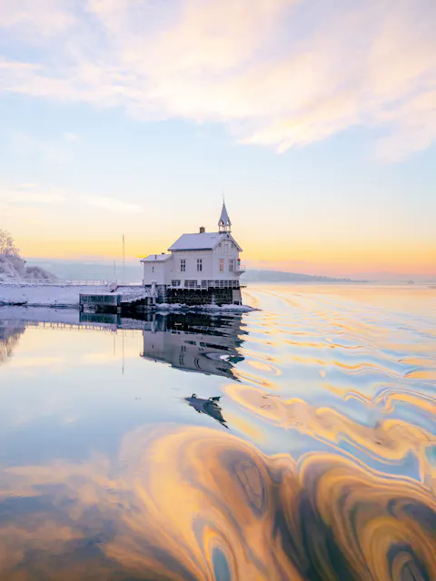 Sailing past Heggholmen lighthouse in winter Shawn van Zyl 2